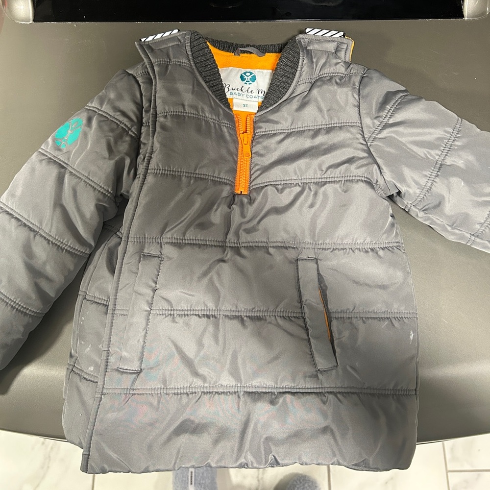 Buckle me baby coat